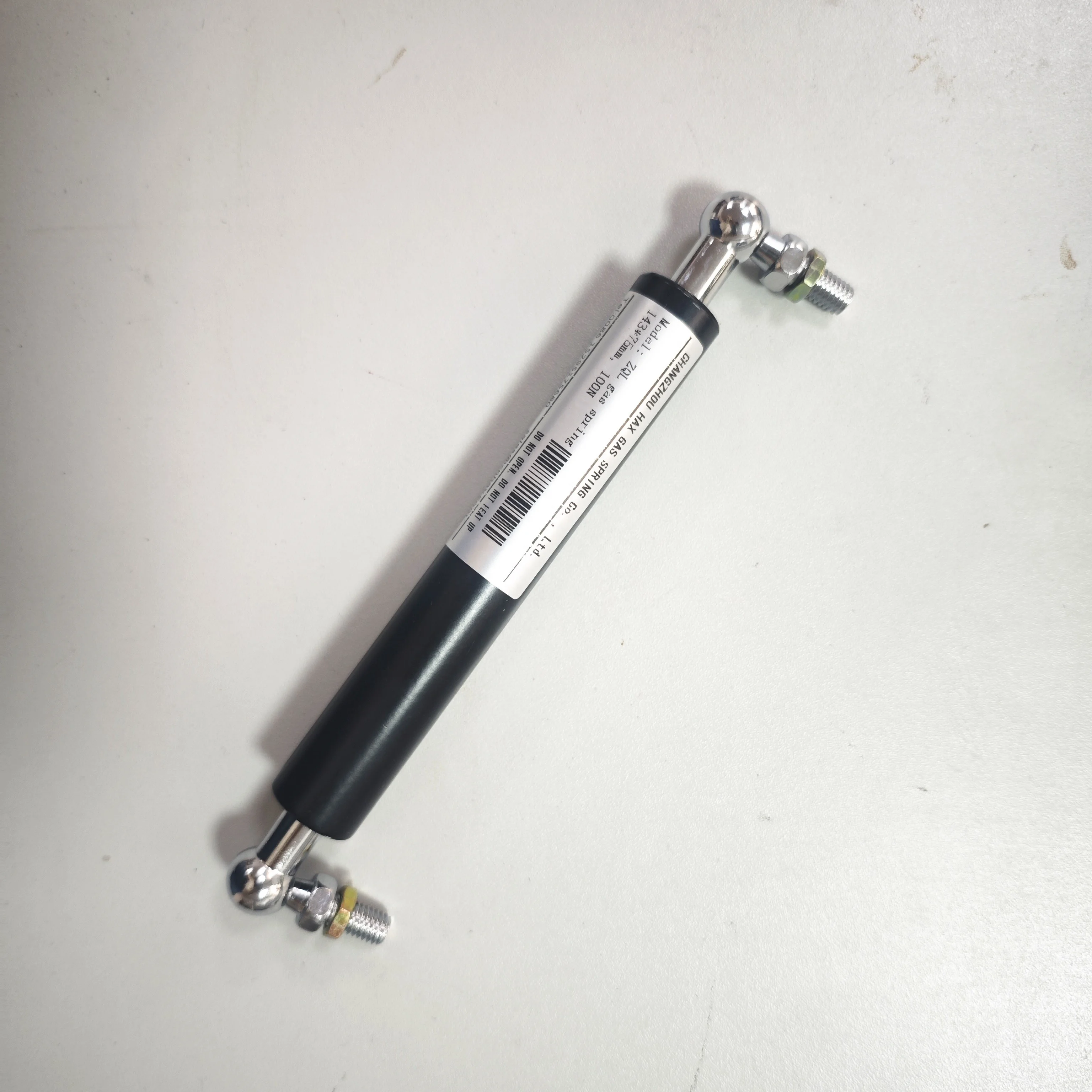 spring-loaded gas spring monitor arm