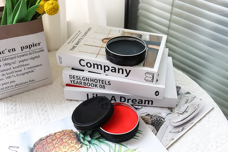 hockey sticks candles wax out of the container to rub on tape to keep snow off