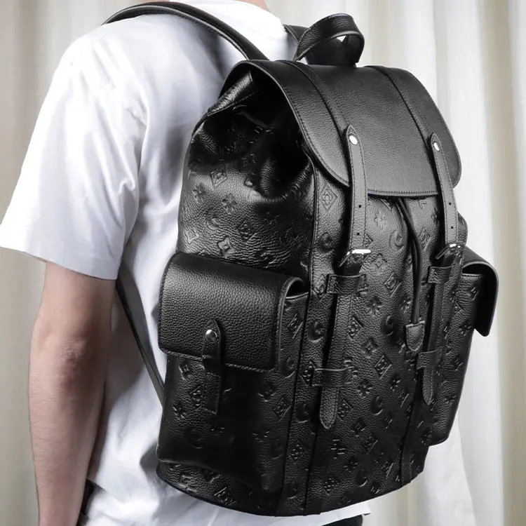 2024 Customized High Quality Stylish Model Factory Wholesale Embossed Monogram Pattern Backpack With Laptop Pocket For Daily