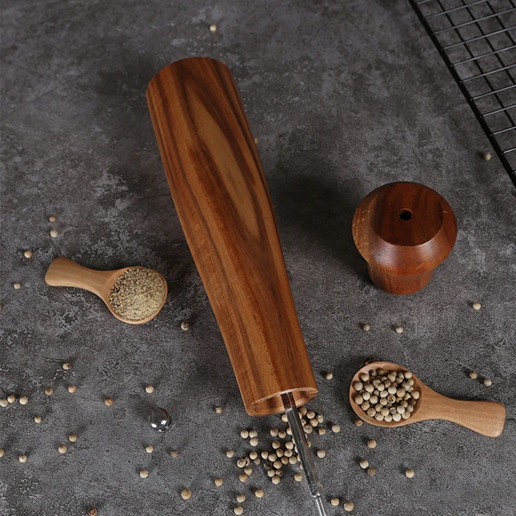 Pepper grinder made of acacia wood and constructed with ceramic core and stainless steel hardware, which makes it use easily