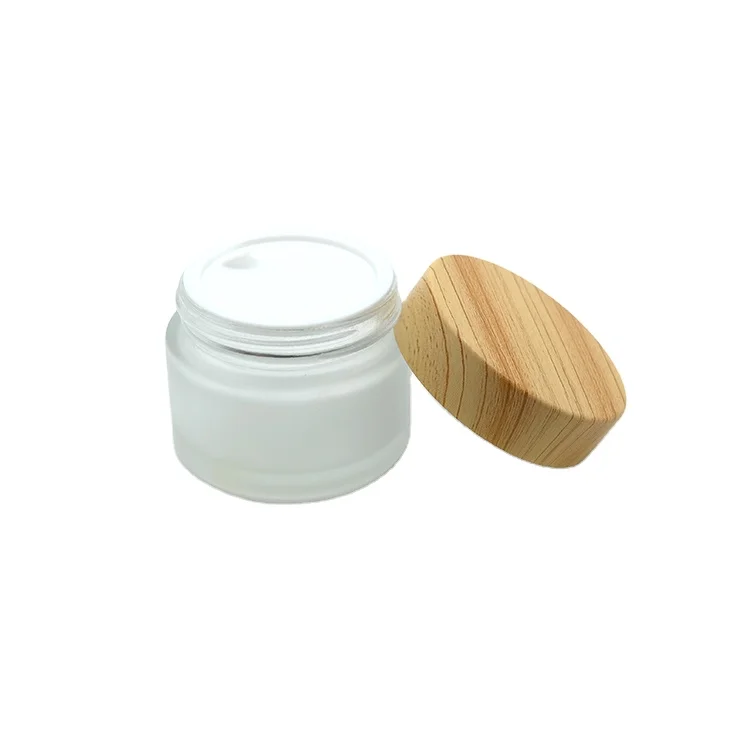 Hot sale 15g 30g 50g 100g Skin Care Packaging Frosted Glass with Wooden Bamboo Lids  Cosmetic Skincare Bottle Cream Jar