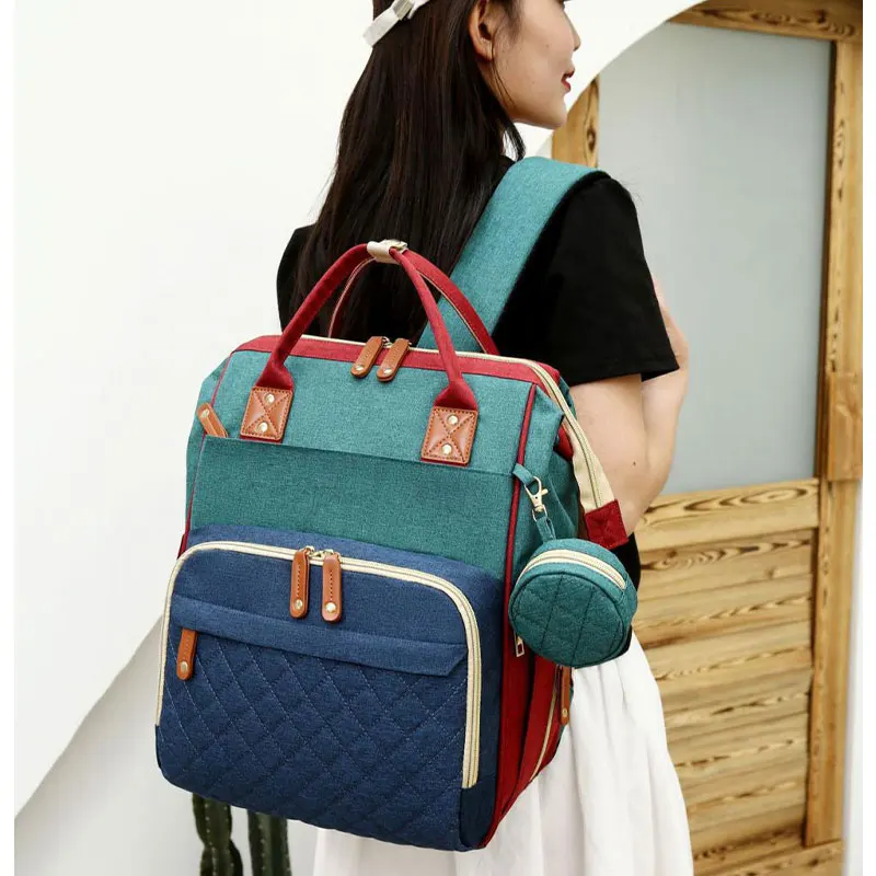 Trendy New Professional Outdoor Mommy Backpack Carrier Nappy Diaper Bags Baby Diaper Bags With Bed