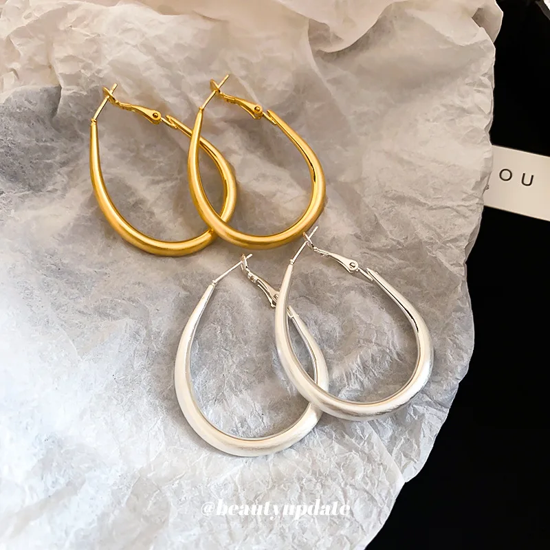 Gold electroplated silver needle oval metal hoop earrings for women cold wind personality fashion everything with