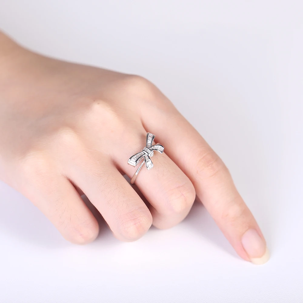 
Sun Star Custom Made 18K Gold Jewelry Ring Bowknot Design Diamond Baguette Cut Engagement Ring For Women 