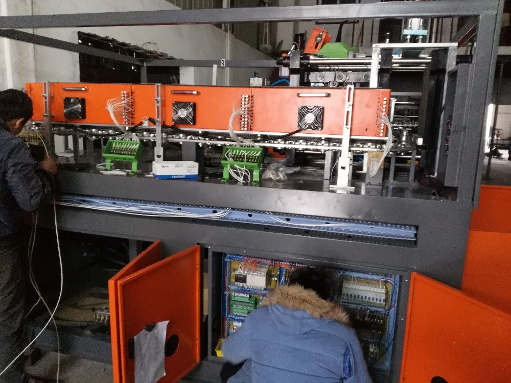 Full - automatic bottle blow moulding machine