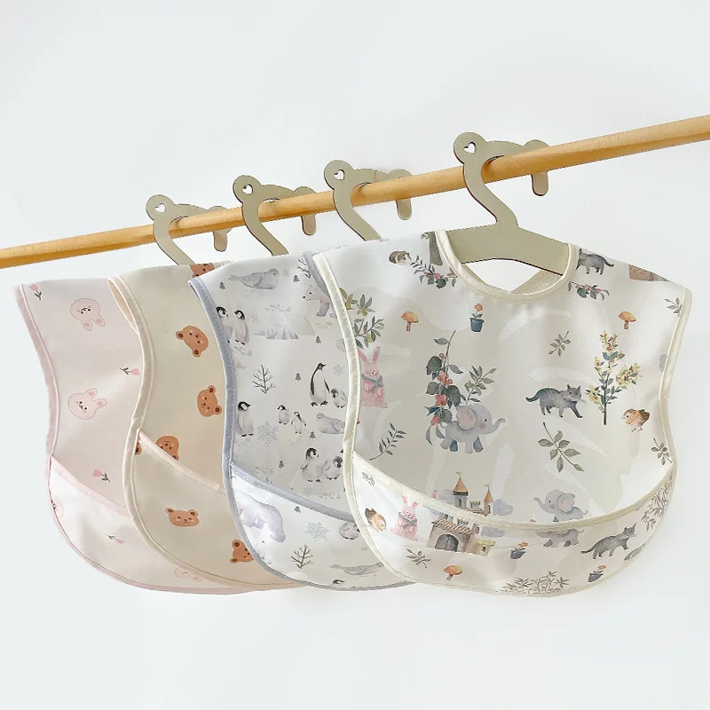 PU Smock Manufacturer Wholesale Adjustable  Fabric Of Baby Feeding BibsprintWaterproof short Sleeves baby items  Baby Bibs