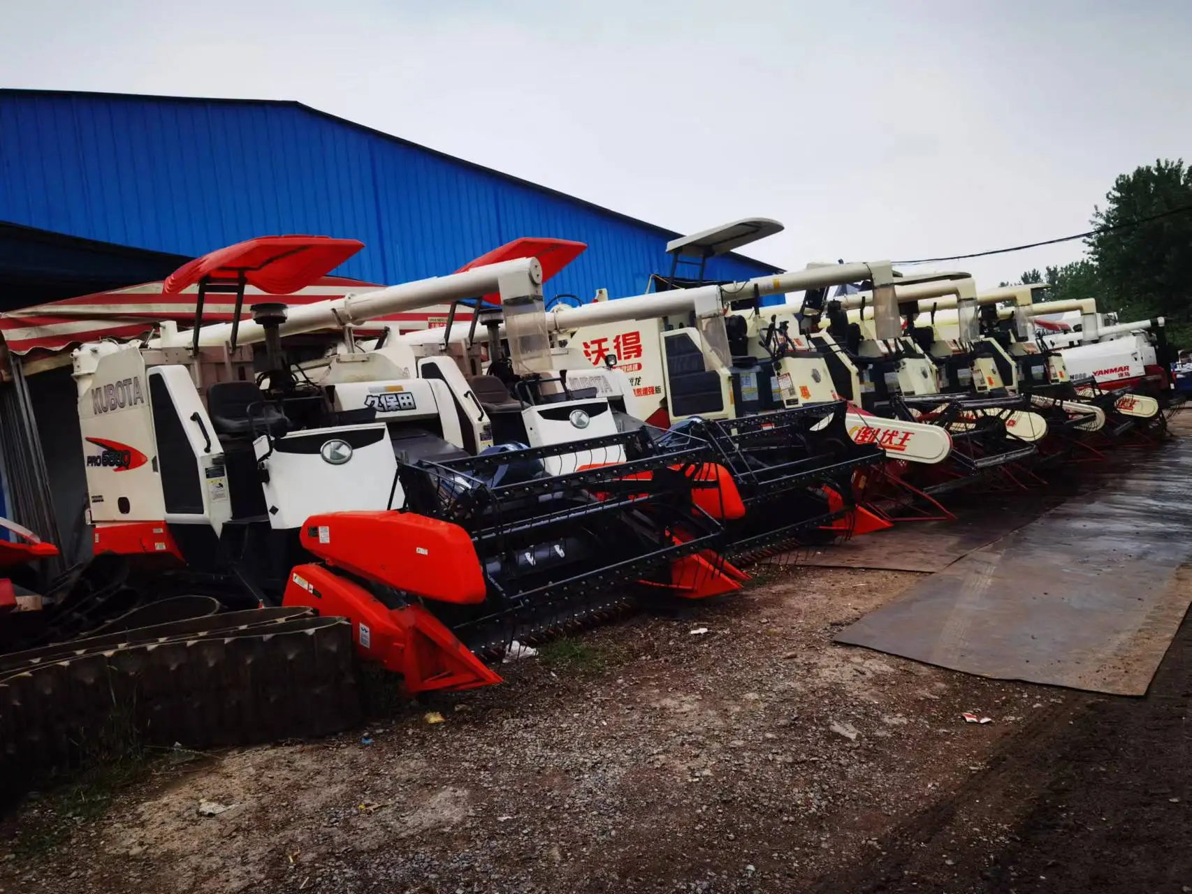 low price Chassis raised world  112HP rice and wheat combine harvester