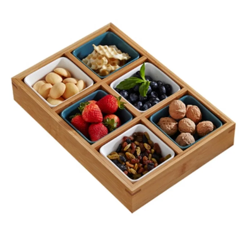 
Dried fruit, fruit and vegetable platter of bamboo and wood 