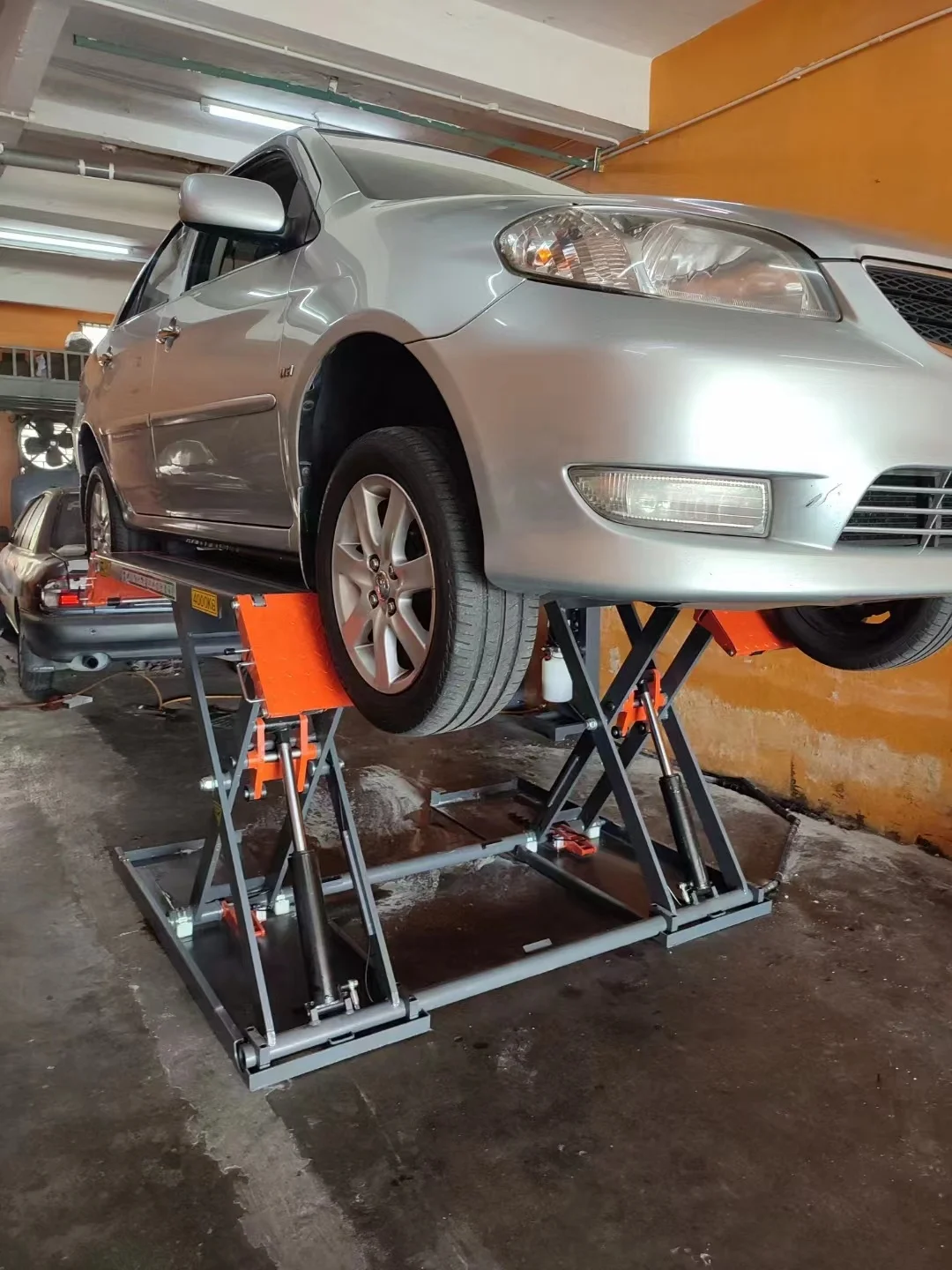 1.2m 4000kg hydraulic motor auto motive scissor car lifting platform sell well