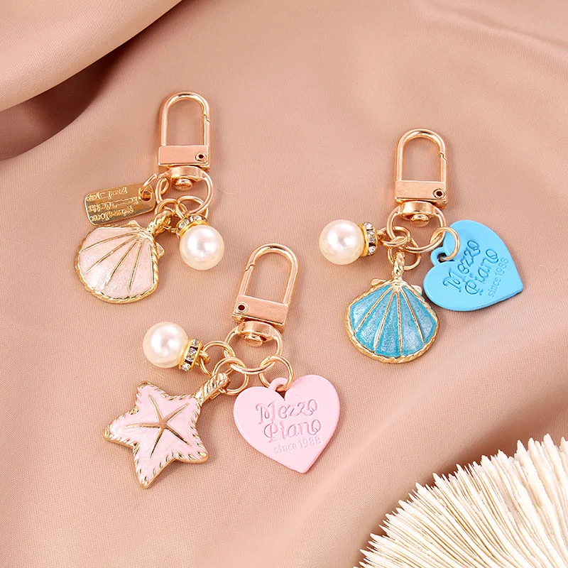 New starfish shell keychain pendant airpods case bluetooth headset case bag charm small gift keychain pendant