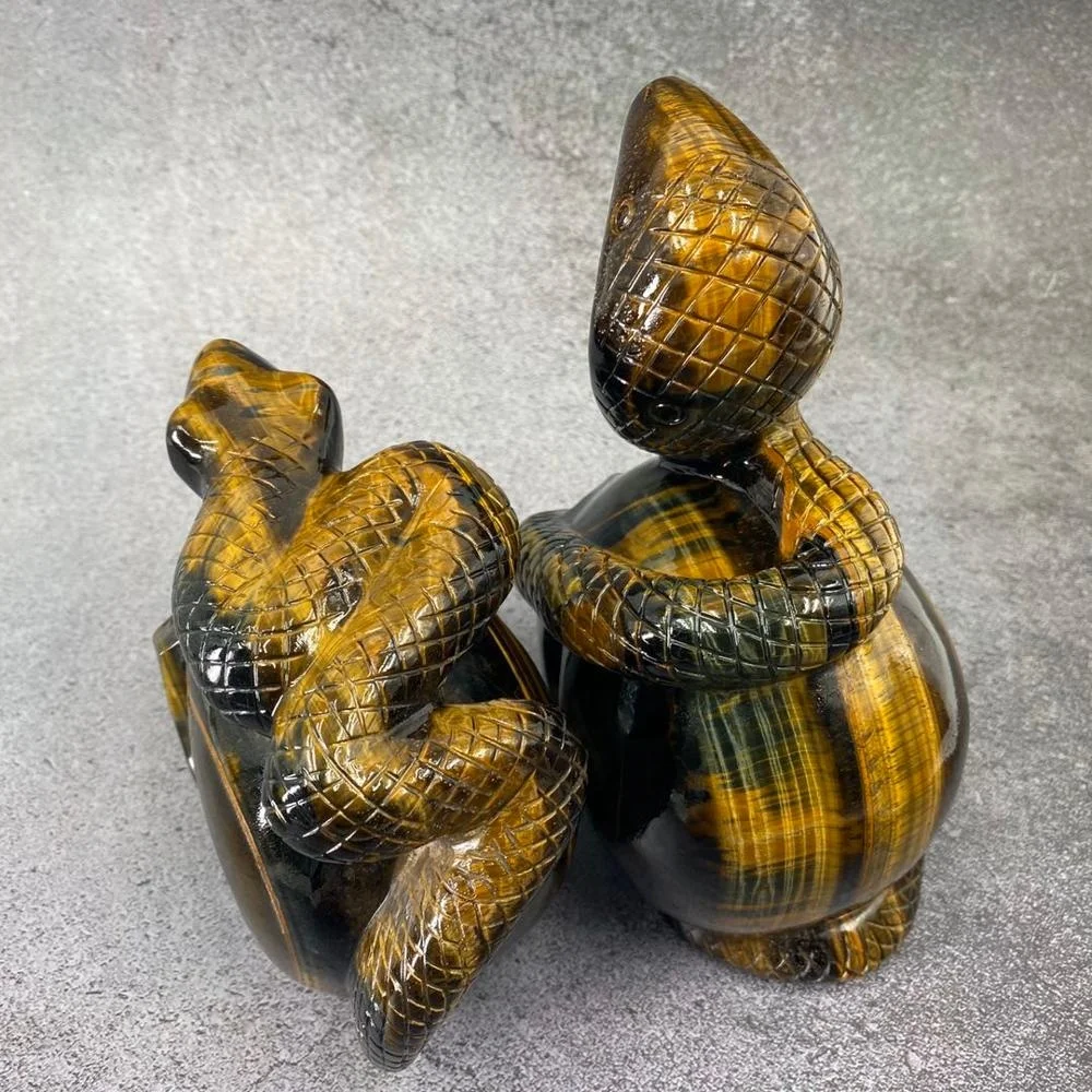 Customized product hand carved crystal skull with snake art sculpture folk crafts tiger eye skull for decoration