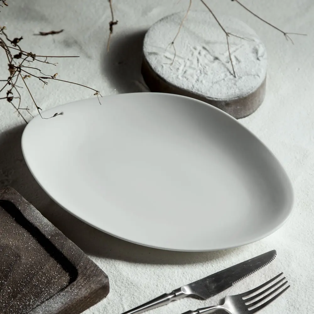 Oval White Porcelain Plate High Quality Nordic Reactive Glaze Irregular Ceramic Fish Plates Serving Dishes For Restaurants