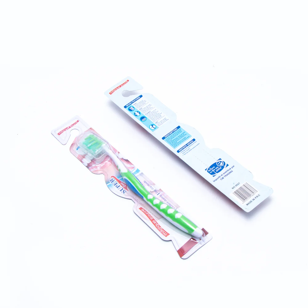 Innovative manual fat handle gum massage feature adult toothbrush with silicone