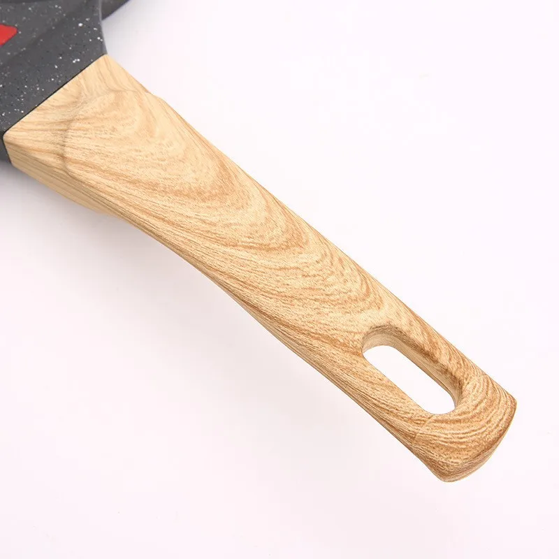 New product temperature sensitive four hole egg frying pan non stick flat bottom net red wheat rice stone frying pan household