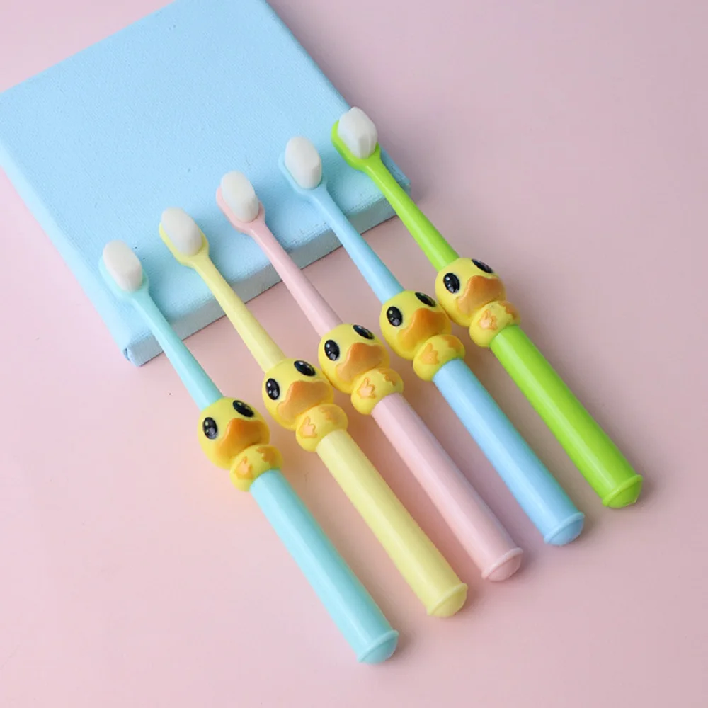 
Lovely duck image 10000 bristles soft rubber handle toothbrush for kids 