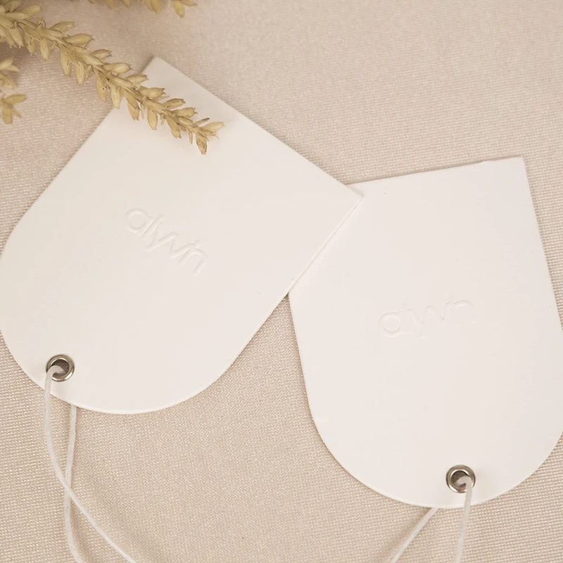 custom embossed logo metal eyelet hangtag paper swing tag arch shape tag with string