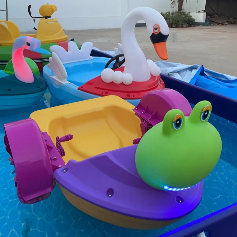 Fun amusement low price cartoon hand boat for kids paddle wheel boat water paddle boat