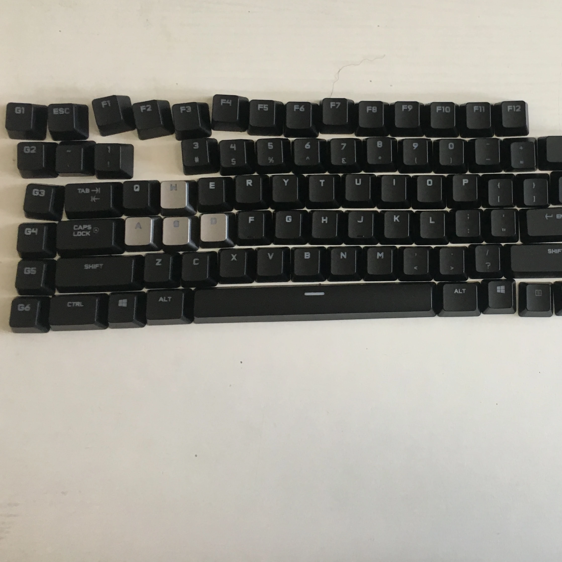 Original Logitech G710+gaming keyboard with replacement keycaps