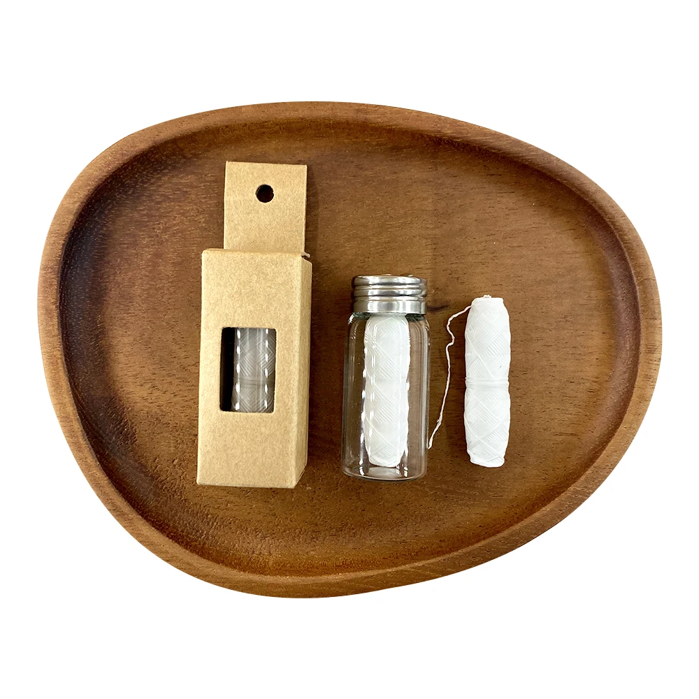 Wholesale Factory 30m Glass Bottle Dental Floss Biodegradable for Home Hotel Spa Tooth Cleaning Dental Floss