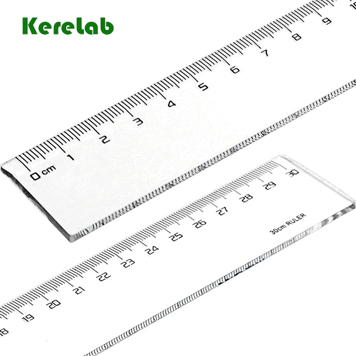 A four-piece set of student stationery contains a 15cm ruler, a 45-degree triangle, and a 60-degree triangle protractor