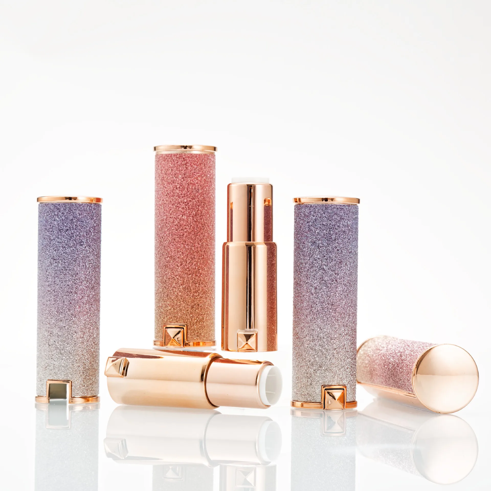 Spot hot selling 12.1mm Rose gold gradient lambskin lipstick tube cosmetic packaging material
