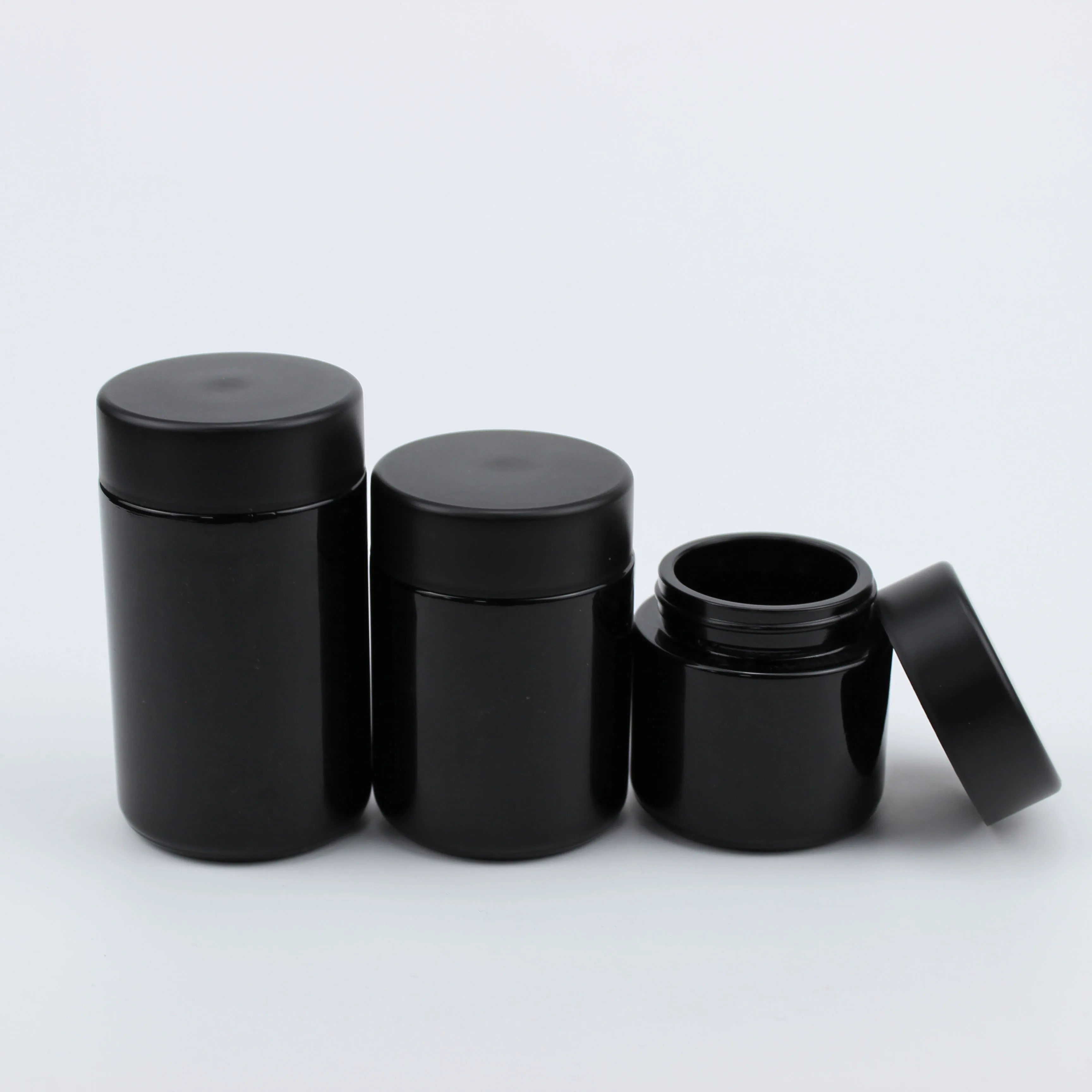 Wholesale 2oz 3oz 4oz Cosmetic Round Clear Straight Sided Weed Glass Jar For Hemp CBD Flower