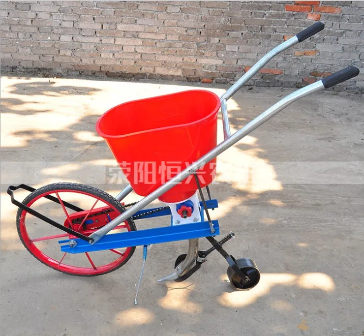 
Hot sale hand push corn seeder,hand seeder spreader,manual corn seeder 