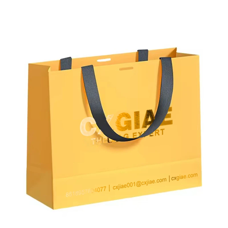 Custom logo printed luxury gift paper bag jewelry yellow cardboard shopping paper bags for clothing shoes