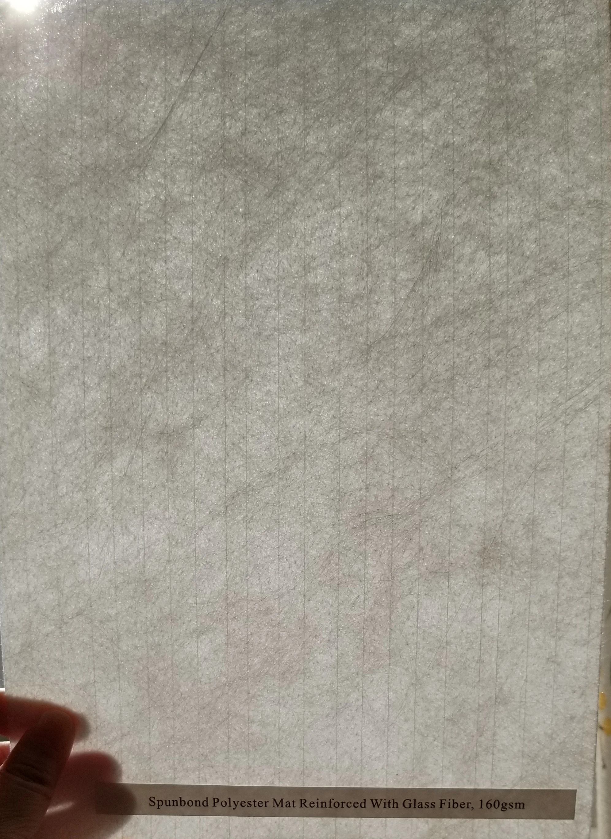 Reinforced spunbond polyester mat for APP/SBS waterproofing membrane