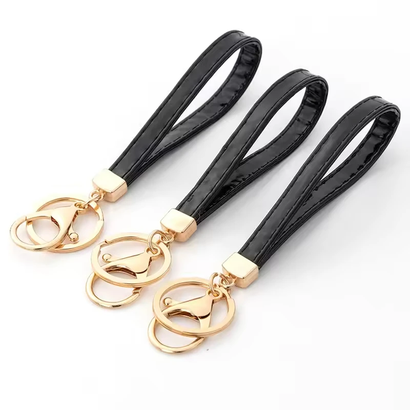 Latest Creative PU Leather Rope Keychain Car Key Ring Bag Pendant Accessories DIY Keychain Carabiners Promotional Keychains