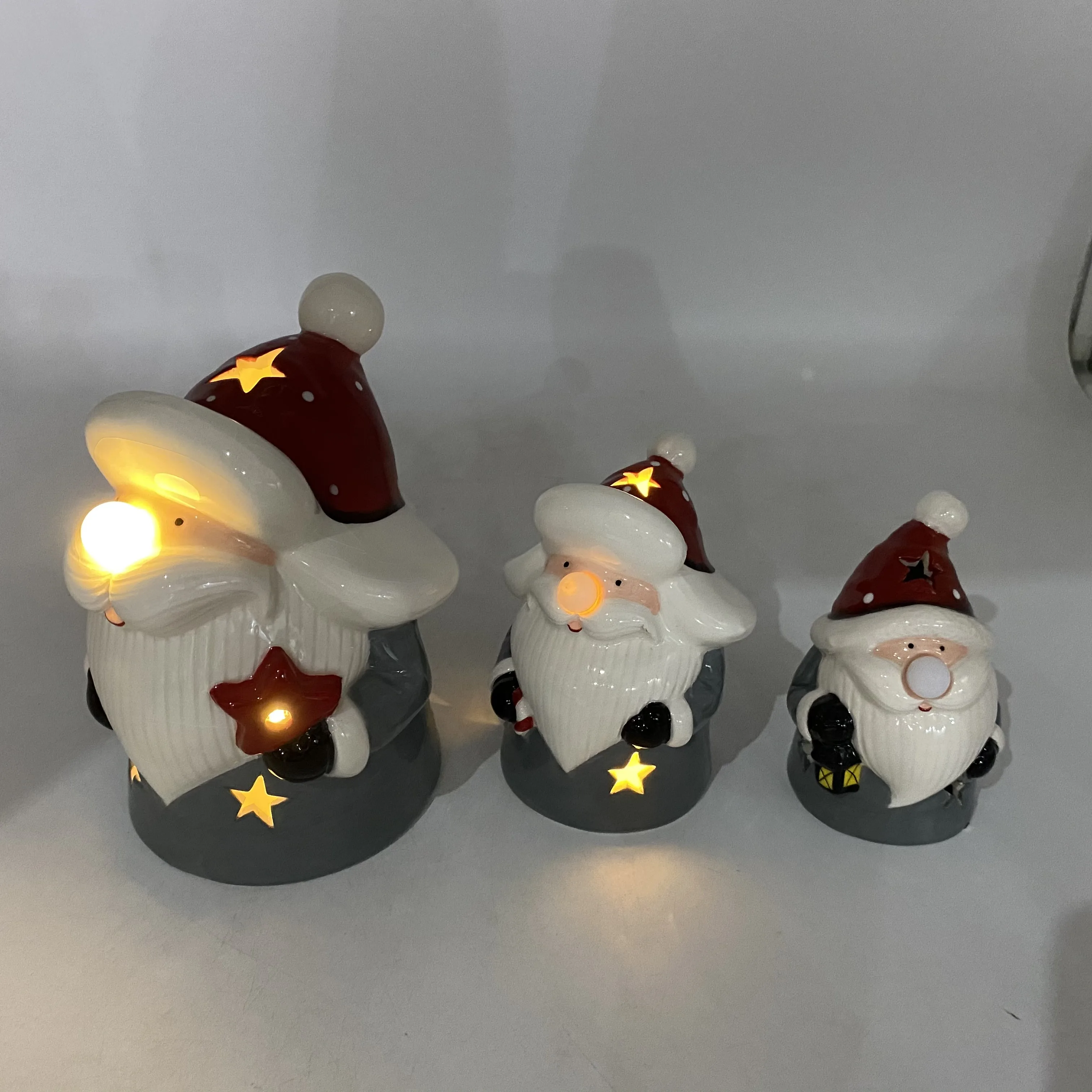 
2022 latest style xmas decoration Christmas festival ceramic ornament led light santa figure home decor 
