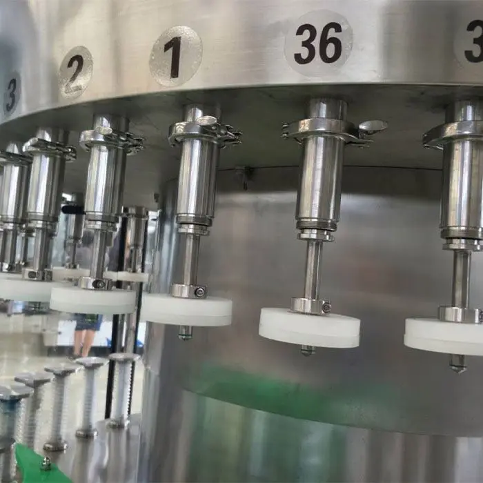 High Efficiency Automatic vacuum rotary 12 18 24 36 Heads liquid filling machine vodka spirit whisky wine filling machine