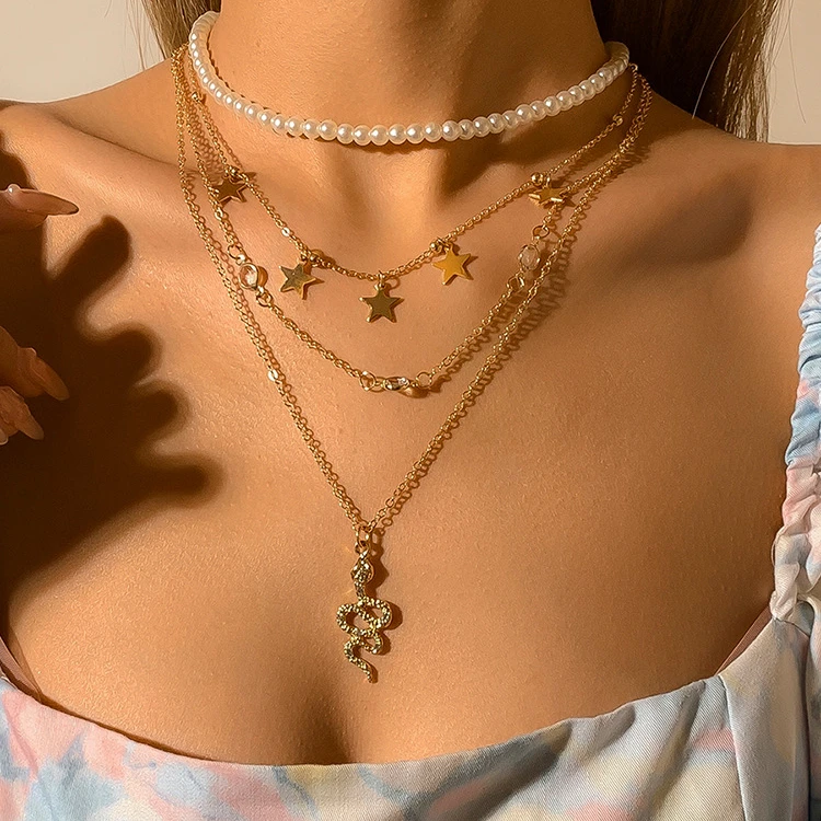 All-match personality female snake-shaped pendant necklace European and American pearl 4-layer star necklace sweater chain