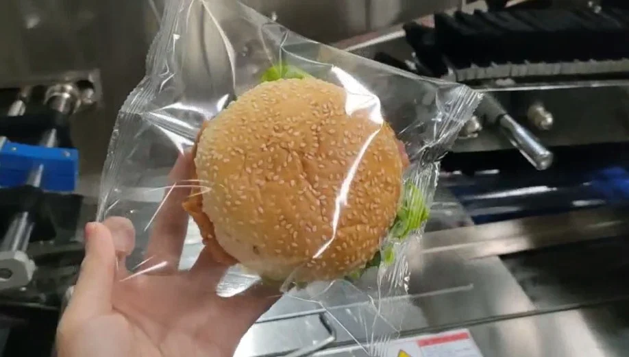 New version Multi-function flow pack envasadora burger bun bread packaging machine