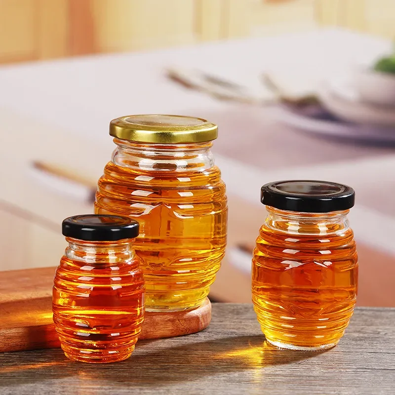 Wholesale Custom Honeycomb Shape Clear Empty 500ml Unique Glass Honey Jars With Lids