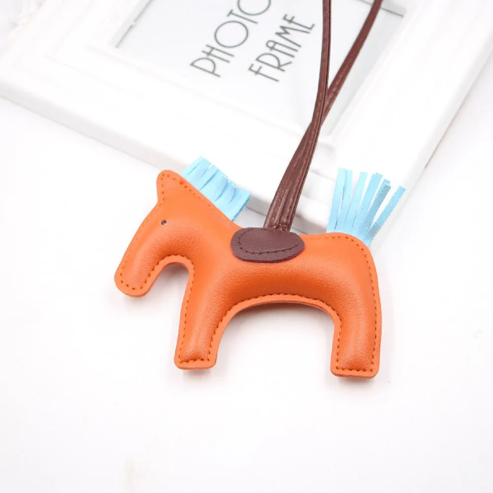 Hot selling cotton filled horse multi-color tassel pendant PU leather keychain hanging rope horse cute fashion bag accessories