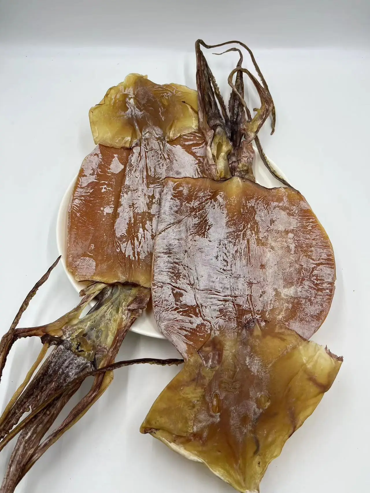 dried dosidicus gigas squid Factory price skin off  dried  peru squid 6- 8 pcs per kg