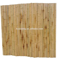poles bamboo fence in natural color /Aged bamboo fence with black twine