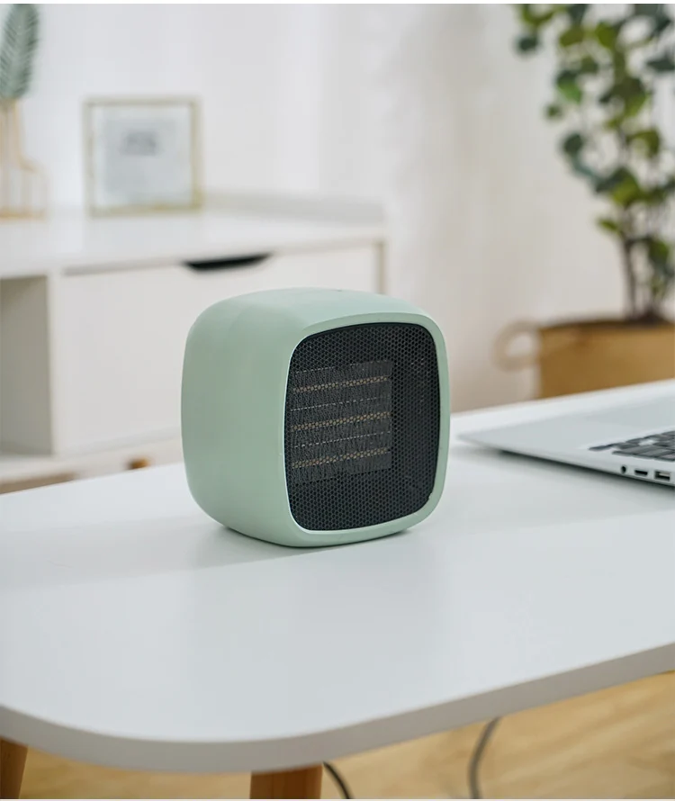 Manufacture New Design Multifunctional Mini Electric Heater Portable Anion Warm Air Purifier Room fan heater for winter