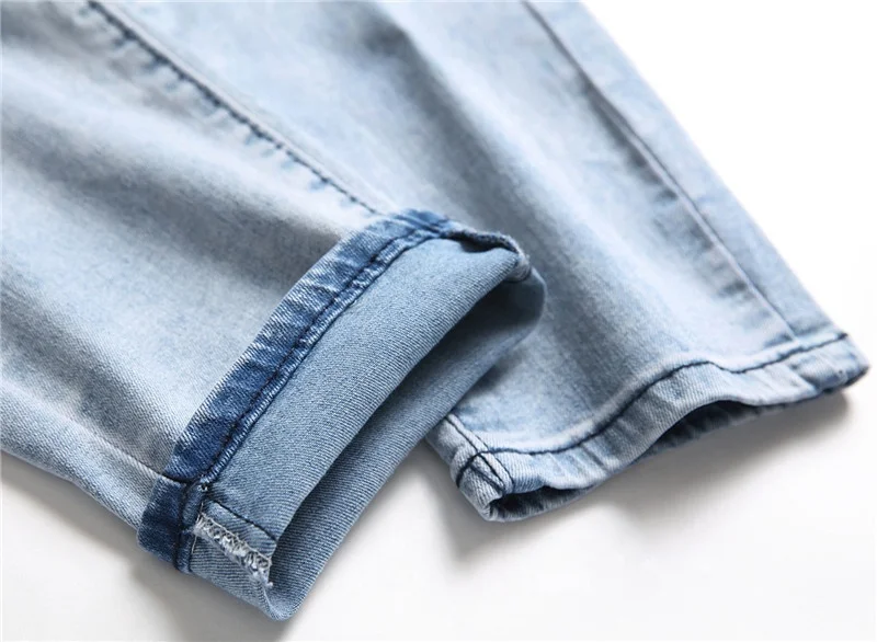 Оптовая продажа с фабрики, прямые продажи новых мужских джинсов, драпированные мужские Узкие повседневные эластичные небольшие мужские джинсы