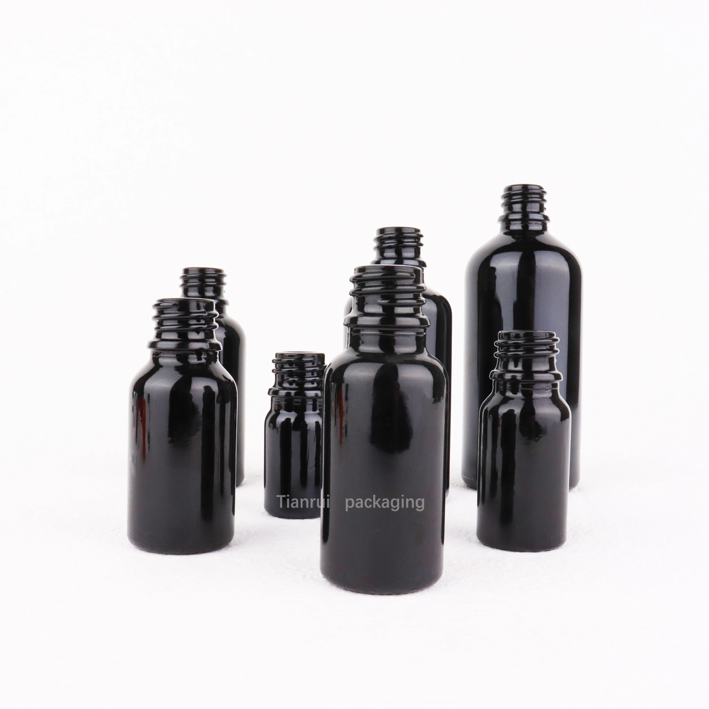 Custom 5ml 10ml 15 ml 20ml 30ml 50ml 100 ml UV Proof Black Essential Oil Glass Dropper Bottle with Sliver Lid in Bulk
