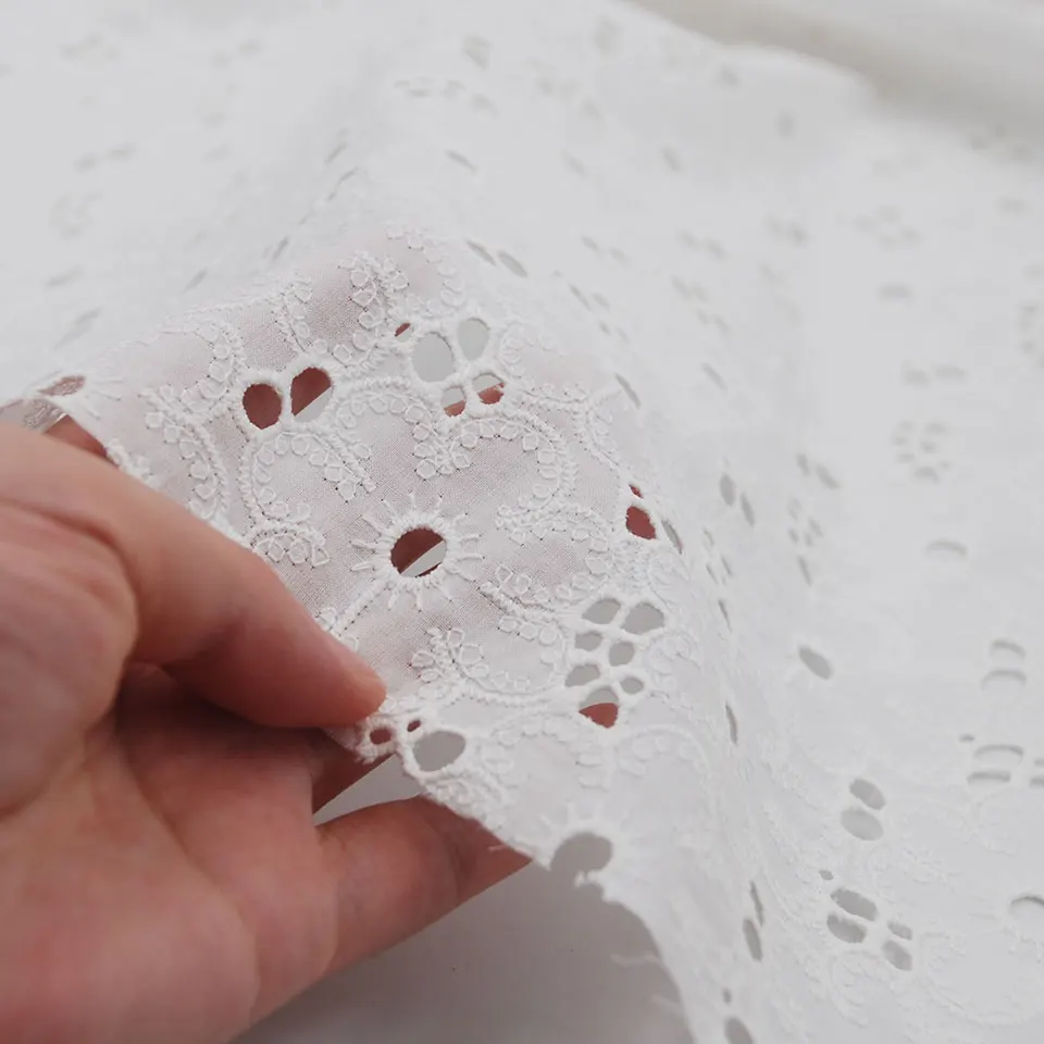China cheap wholesale price european white tulle pure cotton luxury hollow embroidery lace fabric