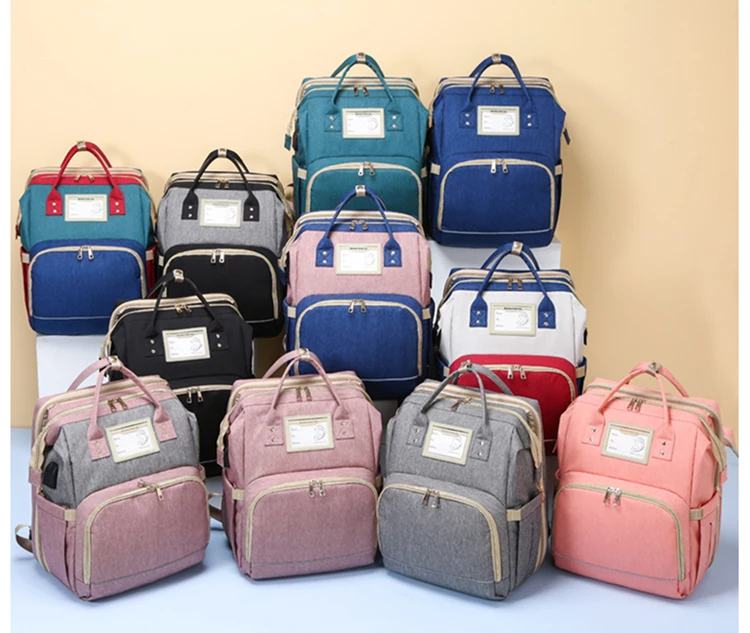 2021 custom new style diaper bag backpack with travel bassinet Diaper Bag Backpack with Mosquito Net Foldable Baby Bed