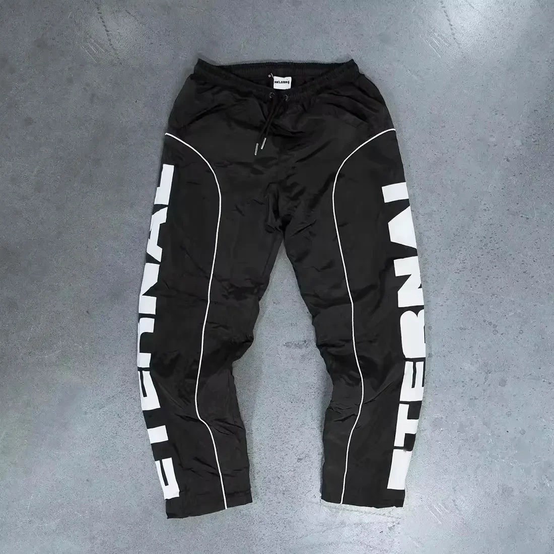 OEM Custom High Quality Sports Running Reflective Oversized Baggy Wide Leg Pants Track Pants Windbreaker  Nylon Pants For Men