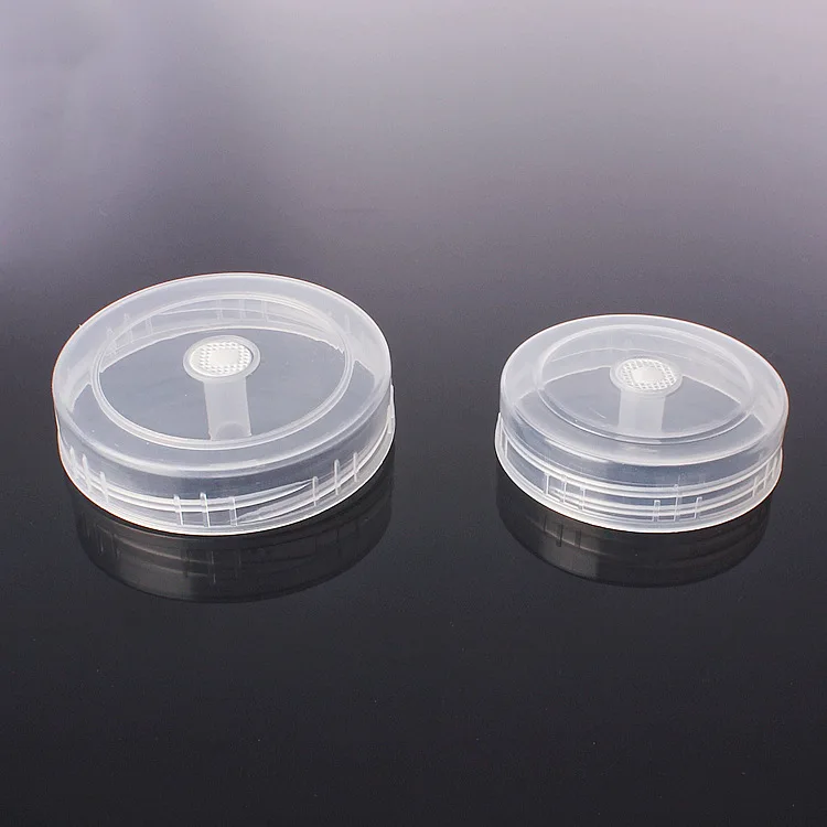 Hot selling 650ml orchids glass tissue culture bottle with breath hole lid wholesale