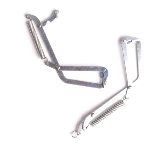 Spring loaded fish hook trap