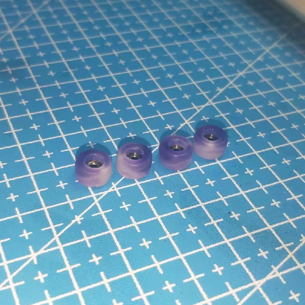 Purple white handmade fingerboard wheels