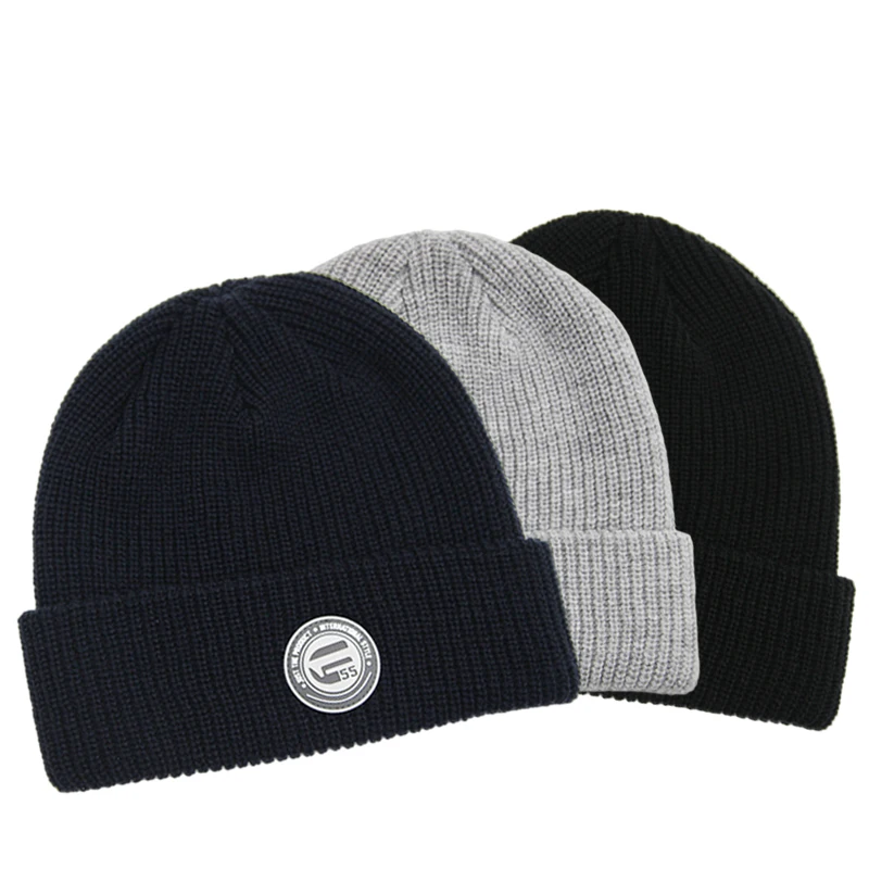 Winter Eco Friendly Acrylic Slouchy Knit Cuffed Roll up Edge Skull Cap Fisherman Beanie with Custom Logo Silicone Rubber Patch