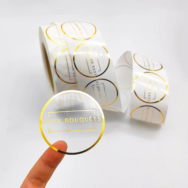 Custom roll logo printing adhesive waterproof gold foil clear vinyl logo label transparent stickers for packaging
