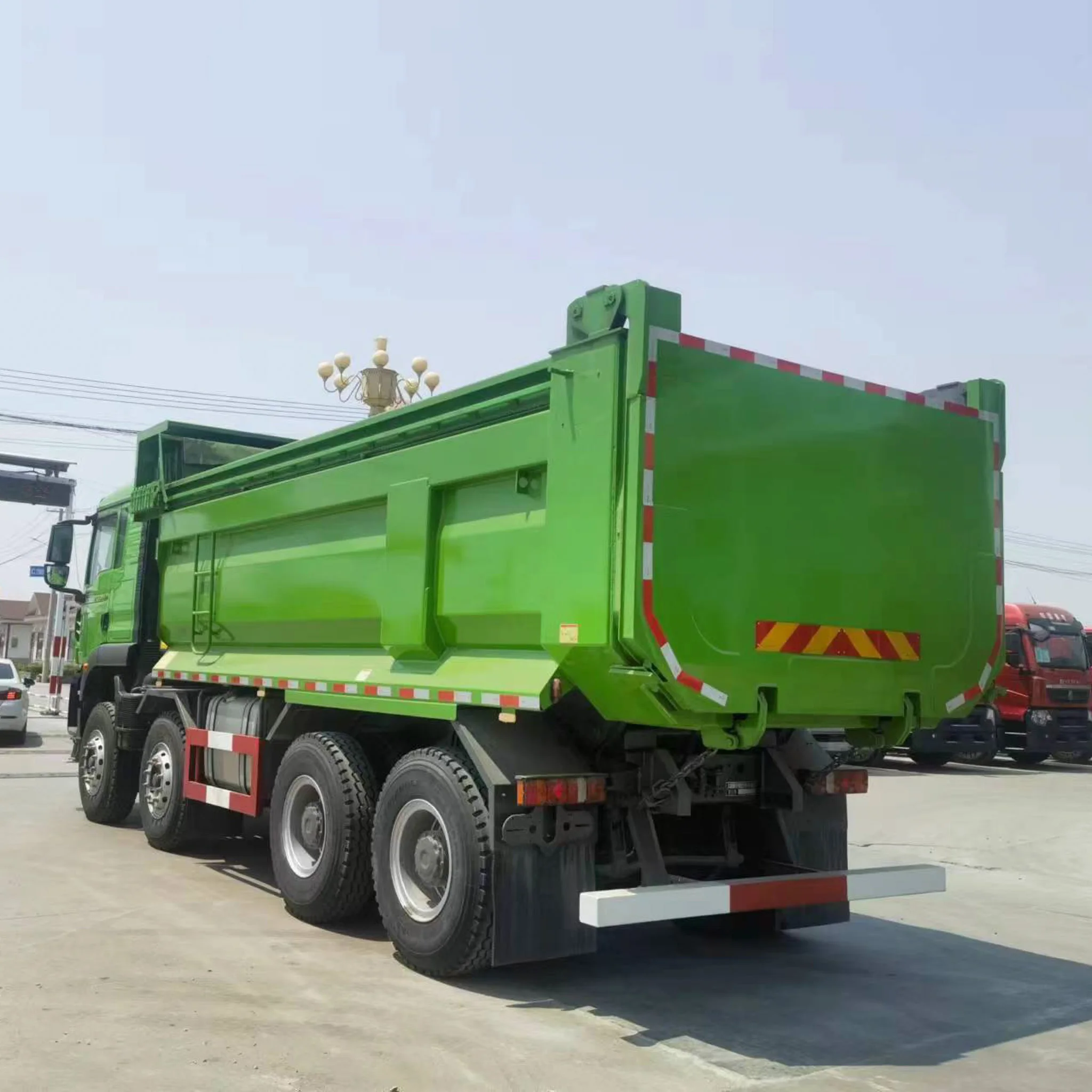 China Sinotruk Factory Price Howo TX Heavy Duty Dump Truck 8x4 Tipper Truck For Construction Mining Transportation